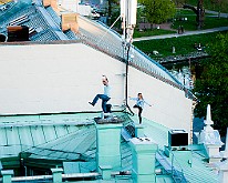 Drunk guys on a roof, Kungsportsplatsen, Gothenburg, Sweden